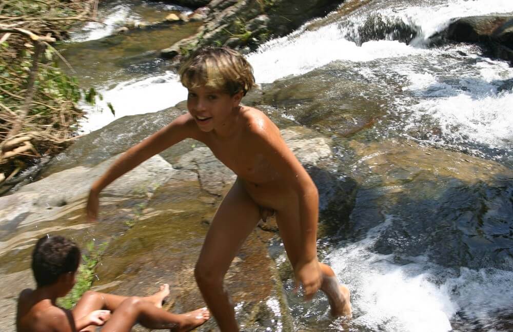 Brazilian Cliff Slide pics - Living without unnecessary worries or restrictions is the essence of naturism