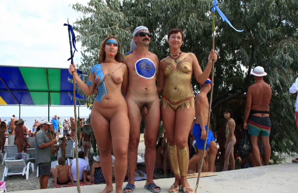 Three Painted Girl Poses pics - Naturists are open to new ideas and experiences