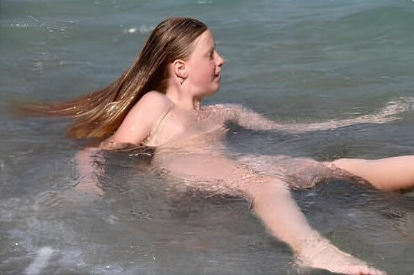 Turqoise Water Splash pics - Living with joy and ease is part of the naturist lifestyle