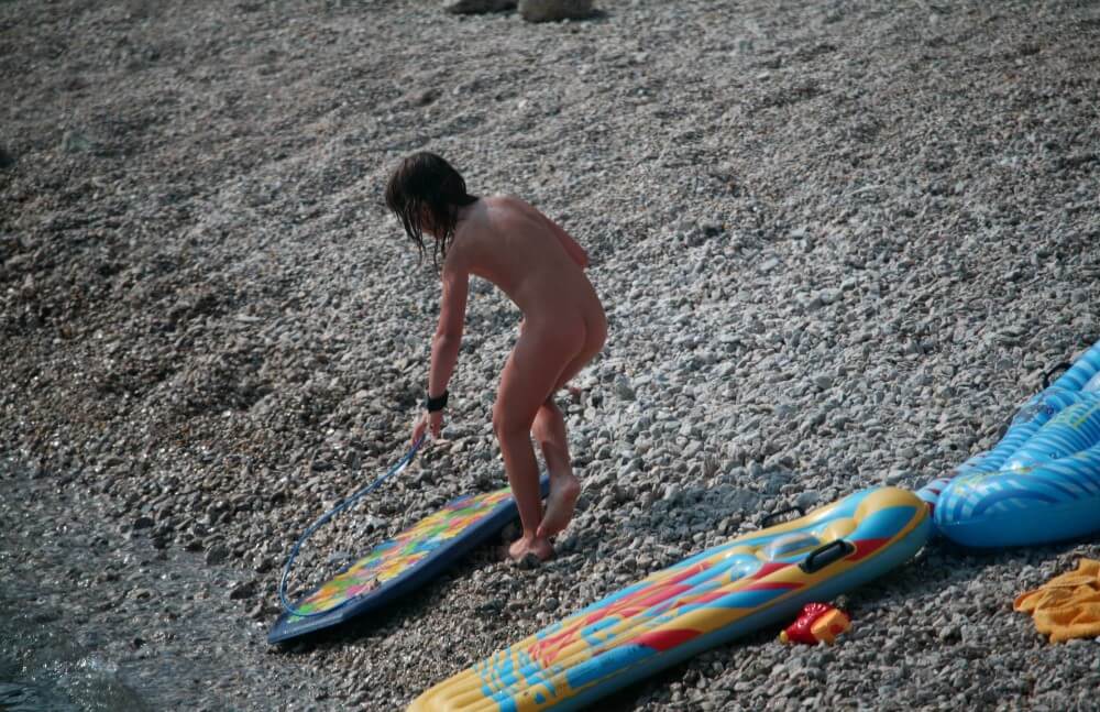 Naturist Surf Board Glides pics - At the heart of nudism lies the idea of equality and respect for oneself and others
