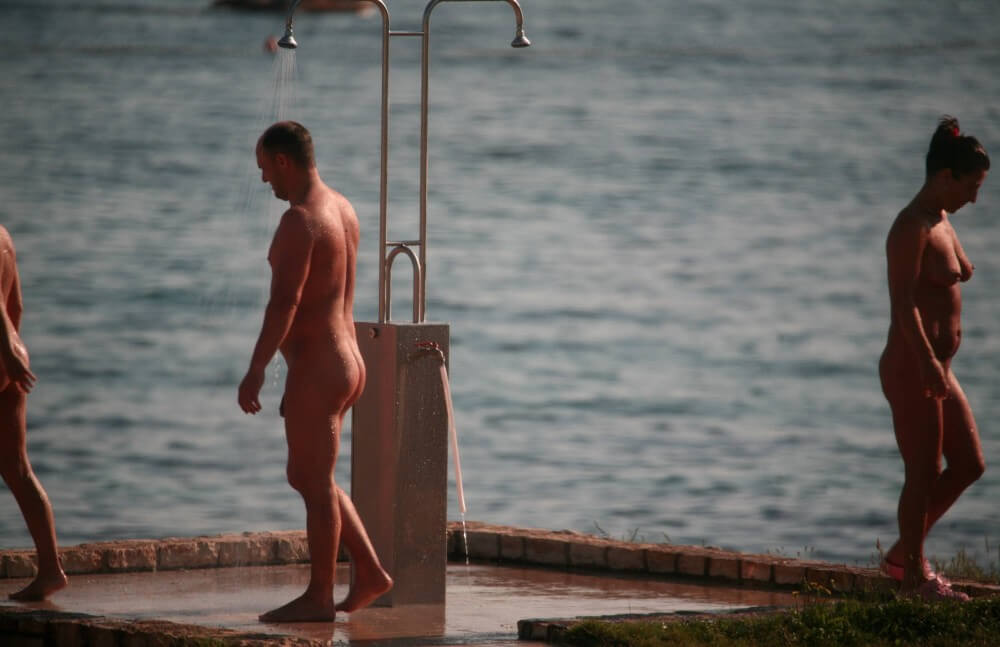 Naturist Shower at Dusk pics - Nudity as a natural part of human existence