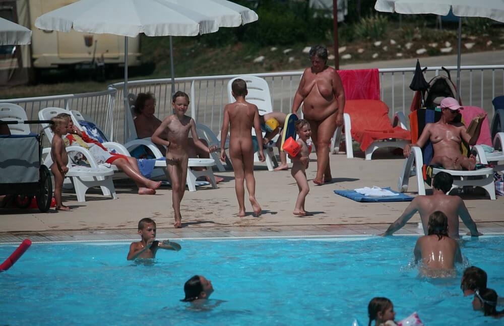 Naturist Afternoon Pool Games pics - Unrestricted freedom as the core value of nudism