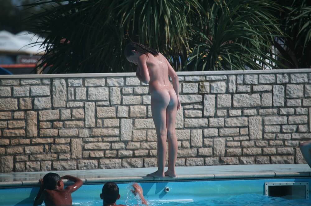 Naturist Pool-Side Singles pics - A slight inclination toward nudism