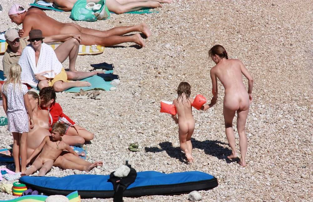 Orange Floaty Safety First Naturist pics - A slight inclination toward nudism