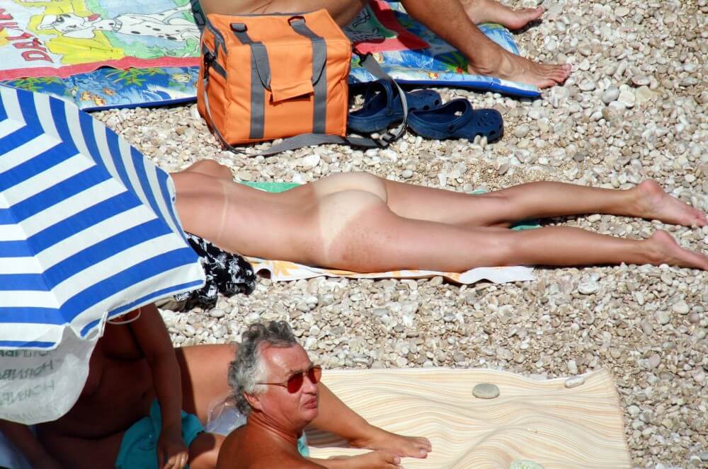 Naturists Beach Relaxation pics - People in a State of Complete Nudity