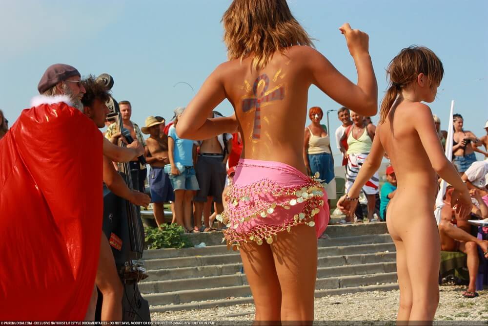 Colorful Carnival Dancing photos - Nudity in naturism is not usually an end in itself